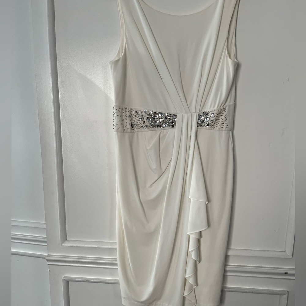 Dry Clean Maggy London White Dress with plenty of details. Size 12. (Ready2Wear)